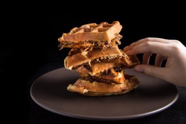 Got leftover pulled pork? Make this BBQ Pulled Pork Savory Waffles Recipe! Crisp, fluffy waffles with flavorful pulled pork. Delicious till very last bite!