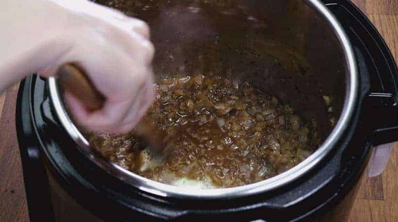 Instant Pot Refried Beans Recipe: deglaze Instant Pot with wooden spoon #instantpot