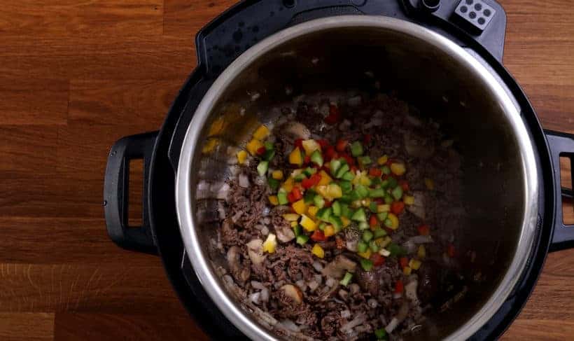 Saute diced bell peppers in Instant Pot Pressure Cooker  #AmyJacky #InstantPot #PressureCooker #recipe #beef #GroundBeef