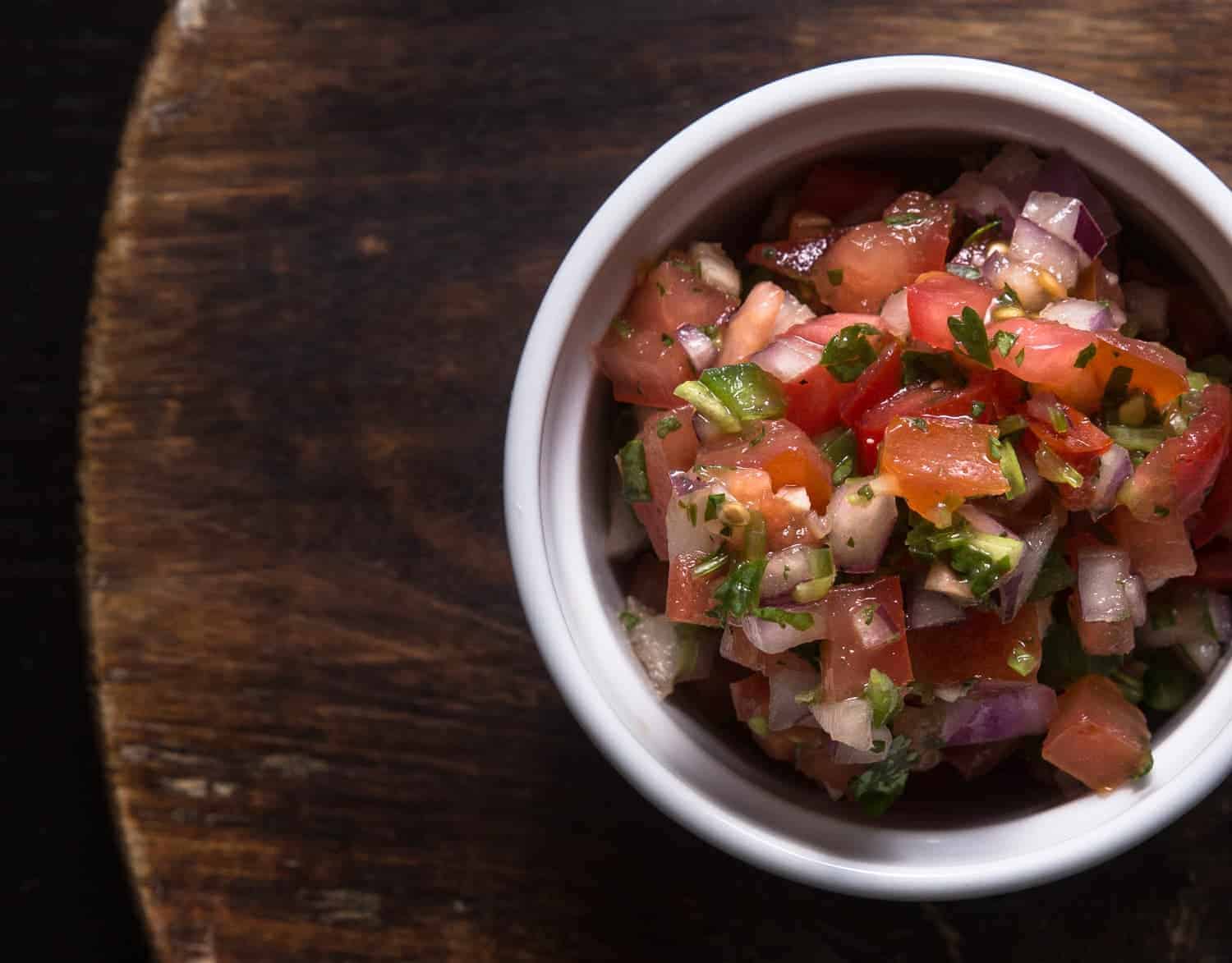 Mexican Homemade Salsa Recipe (Pico de Gallo): excite your taste buds with this easy refreshing Salsa Fresca as a side dish, dip, or topping for tacos.