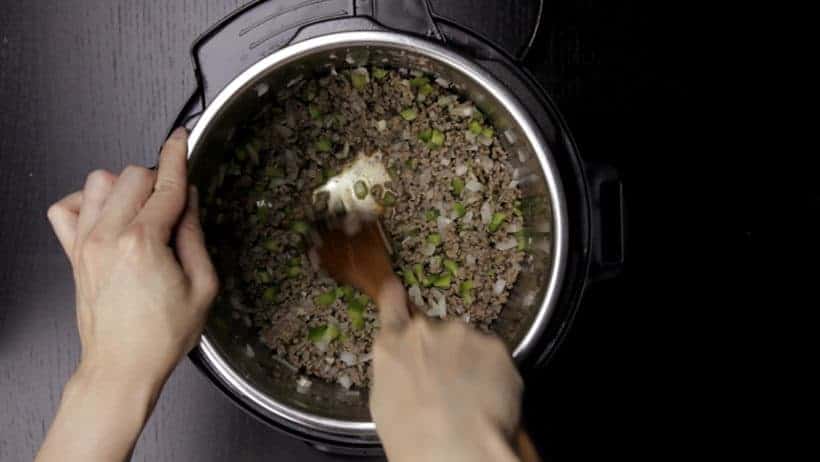 Make Family Favorite Instant Pot Sloppy Joes Recipe (Pressure Cooker Sloppy Joes): deglaze ground beef with wooden spoon