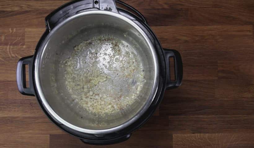 Instant Pot Tuscan Chicken Recipe (Pressure Cooker Tuscan Garlic Chicken): saute minced garlic in Instant Pot Pressure Cooker