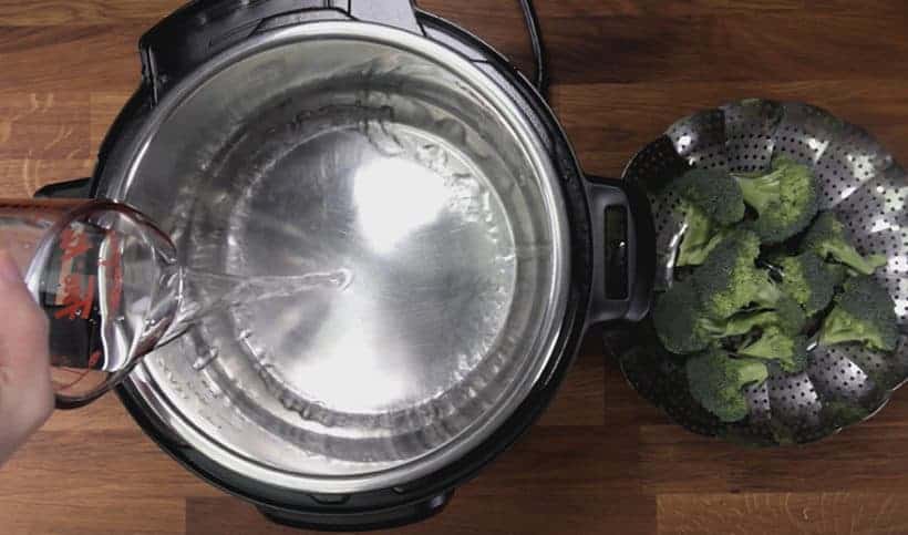 Instant Pot Broccoli Recipe: add water in Instant Pot #instantpot #pressurecooker #vegan #vegetarian #recipe #keto #paleo