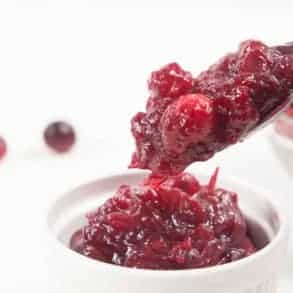 Easy Pressure Cooker Cranberry Sauce Recipe: Tangy & sweet fresh homemade cranberry sauce is great as a jam-like spread, topping for desserts, filling for pastries, glaze for meat, or extra flavor for yogurt/smoothie. Don't just save it for Thanksgiving dinner!