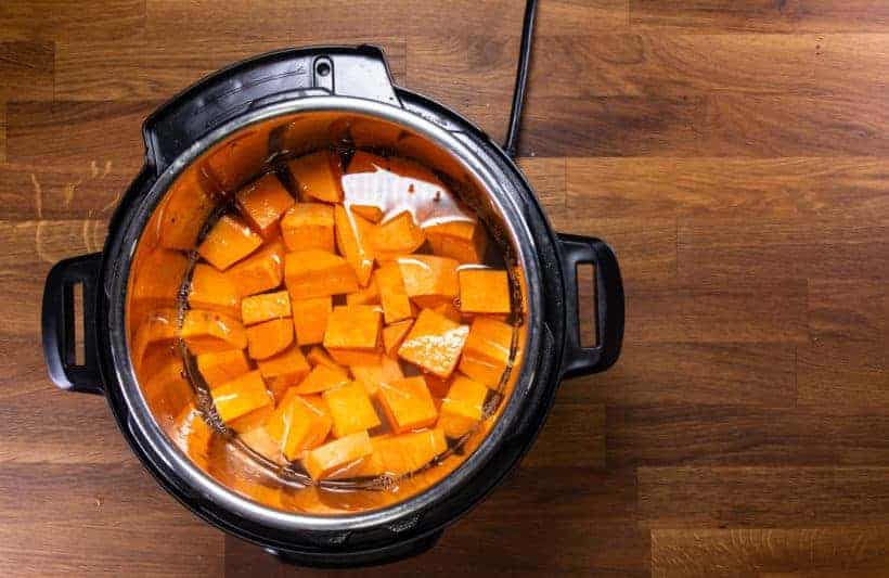 Instant Pot Chinese Sweet Potato Soup: add sweet potato chunks and water in Instant Pot Pressure Cooker